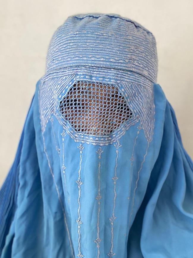 Fatimah wearing a burqa hiding from the Taliban in a Kabul apartment after being accused of being an American spy. Picture: Supplied