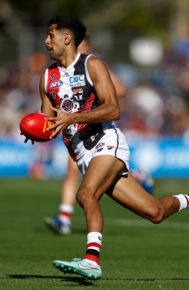 Nasiah Wanganeen-Milera dashes through the middle in Alice Springs. Picture: Michael Willson/AFL Photos via Getty Images