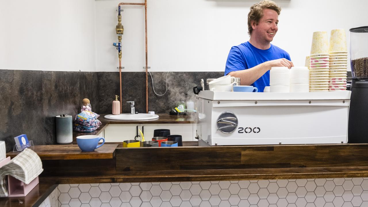 Jordan Wisnewski of W Coffee and Co works the coffee machine in the shop in the Australia Arcade. Picture: Kevin Farmer