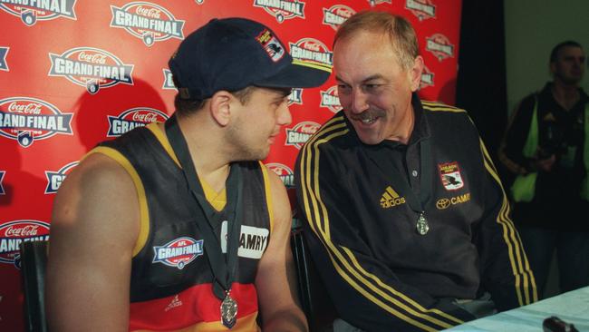 Norm Smith Medallist Andrew McLeod (left) with coach Malcolm Blight after the 1998 grand final victory.