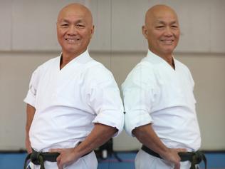 PCYC martial arts instructor Chung Dang with his class behind him - For 30 years, Chung Dang has volunteered at Bankstown PCYC as a martial arts instructor twice a week.  Bankstown NSW. Tuesday, August 18, 2017 (AAP Image / Chris Pavlich)