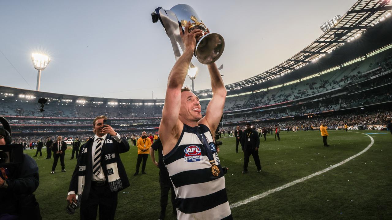 2022 AFL Grand Final between the Geelong Cats and Sydney Swans at the MCG. Geelong Cats captain Joel Selwood celebrates with the Premiership Cup to the supporters. Picture: David Caird