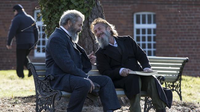 Mel Gibson and Sean Penn in a scene from the movie The Professor and the Madman.