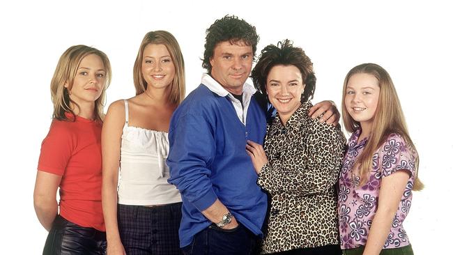 The Scully family in Neihgbours: (From left) Carla Bonner (Stephanie), Holly Valance (Felicity), Shane Connor (Joe), Janet Andrewartha (Lyn) and Kate Keltie (Michelle).