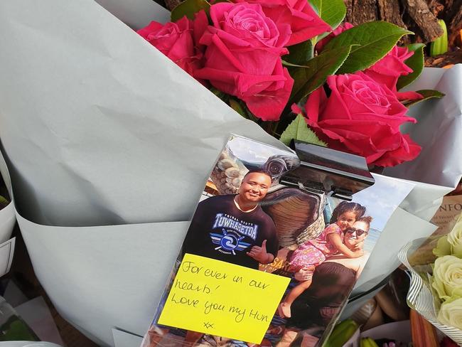 Floral tribute left by Tania Boyte to her partner Timmy Rakei at crash site.