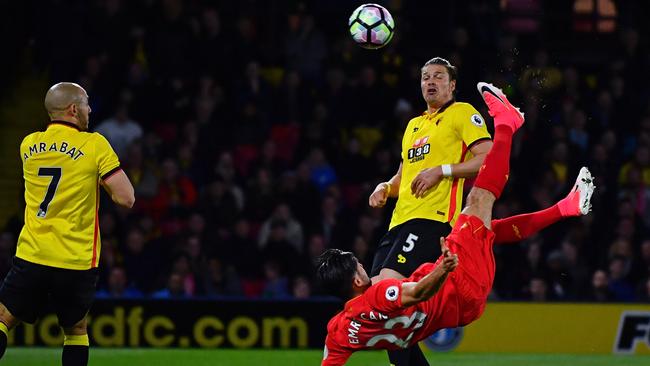 Emre Can of Liverpool scores the opening goal.