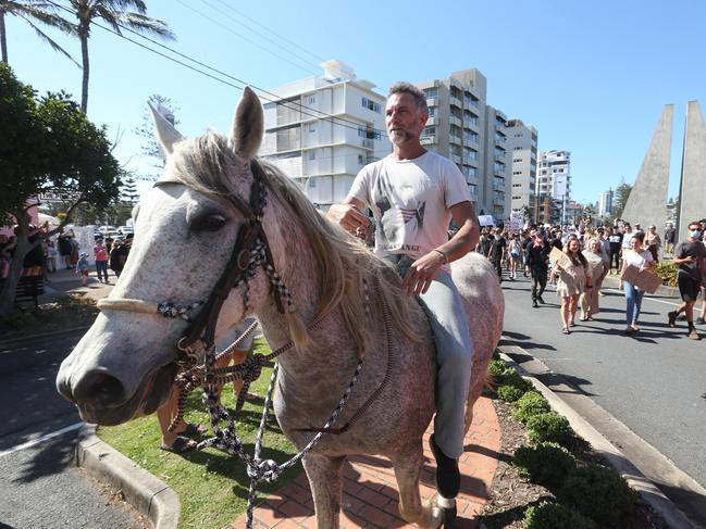 Michael Corrigan, 52, rides horseback at Freedom Protest last year. Picture: Richard Gosling