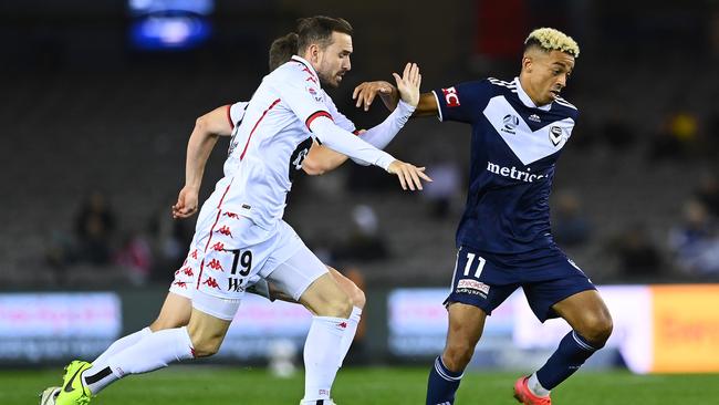 Melbourne Victory’s Gbenga Folami battles WSW’s Jordon Mutch on April 23. Picture: Getty Images