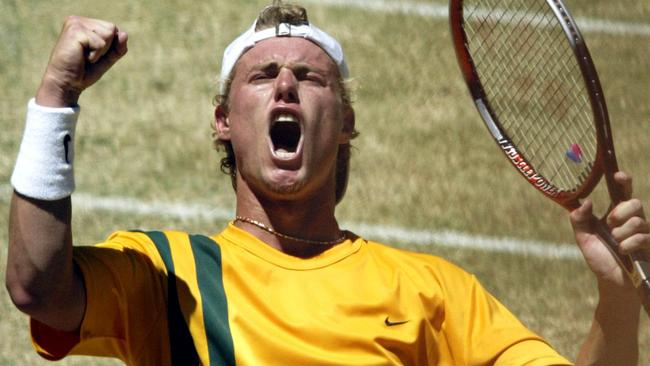 Lleyton Hewitt celebrates after a win over Spain in 2003.