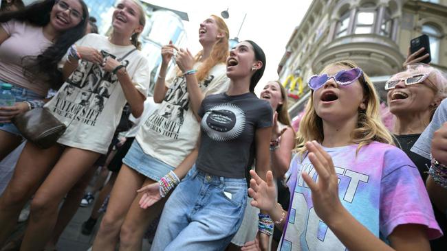 Fans of US megastar Taylor Swift, so-called "Swifties", gather in the centre in Vienna, Austria, after her three scheduled concerts were cancelled. Picture: AFP