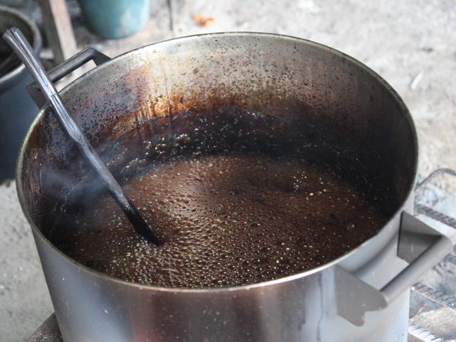 Underground health retreat participants are given ayahuasca in the form of a drink.