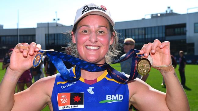 MELBOURNE, AUSTRALIA - DECEMBER 03: Breanna Koenen of the Lions poses with the best on ground medal following the AFLW Grand Final match between North Melbourne Tasmania Kangaroos and Brisbane Lions at Ikon Park, on December 03, 2023, in Melbourne, Australia. (Photo by Morgan Hancock/AFL Photos)