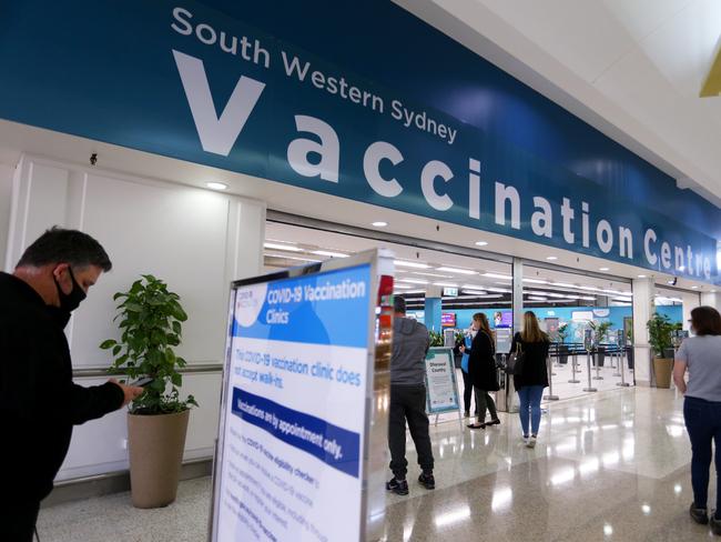 Clients arrive at the newly opened South Western Sydney Vaccination Centre at Macquarie Fields. Picture: Lisa Maree Williams/Getty Images