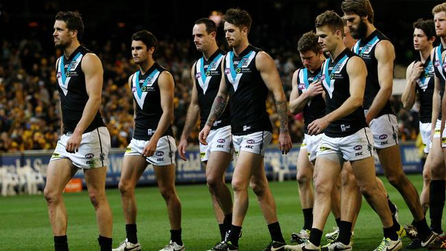 Port Adelaide's Travis Boak leads the team off after the 2014 preliminary final loss. Picture: George Salpigtidis