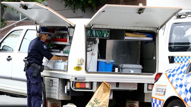 Forensic crime scene police on the scene of a police involved overnight shooting in the underground carpark of the Solaire Apartments on the corner of Ferny Avenue and Cypress Avenue, Surfers Paradise Photo: David Clark
