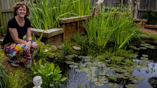 Tracey Duffy in her lush yard. Picture: Annika Enderborg