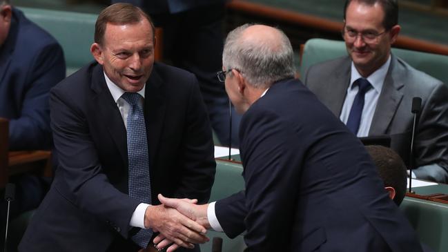 Tony Abbbott (left) shakes hands with Prime Minister Scott Morrison. Picture: Kym Smith