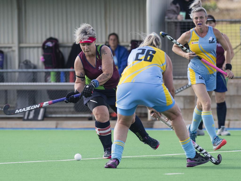 Redlands 1 captain Petra West (left) against Cairns 1.