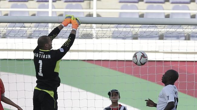 Kyrgyz Republic's goalkeeper Pavel Matiash, third left, concedes a goal during the AFC Asian Cup group C soccer match between China and Kyrgyzstan at the Khalifa bin Zayed Stadium in Al Ain, United Arab Emirates, Monday, Jan. 7, 2019. (AP Photo/Nariman El-Mofty)