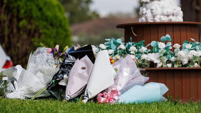 Flowers left outside a house across from the church. Picture: NCA NewsWire / David Swift