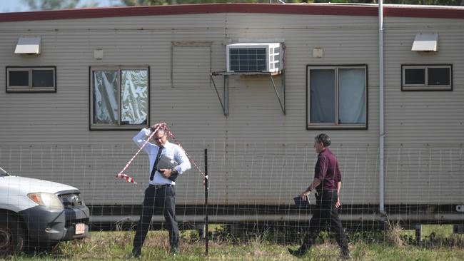 Detectives at Cattledog Court, Humpty Doo donga fire. Picture: (A) manda Parkinson