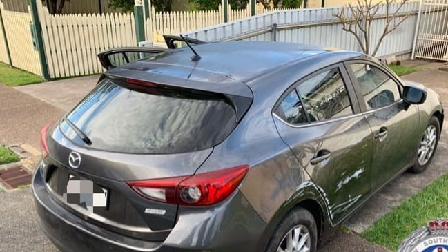 Alleged thief caught napping at the wheel of a stolen Mazda 3. NSW Police.