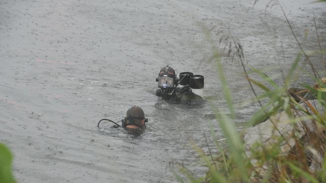 A file image shows police divers searching the Clarence River near Maclean.