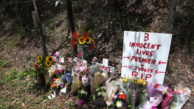 Tributes and flowers at the scene of the fatal Bonogin crash. Picture: Glenn Hampson.