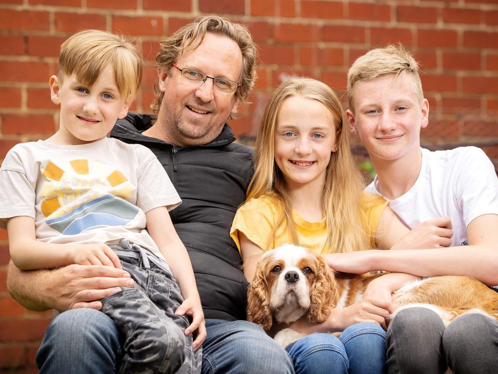 Concerned dad Tom Reynolds with his children Harry, 13, Josie, 11 and Charlie, 7. Picture: Mark Stewart