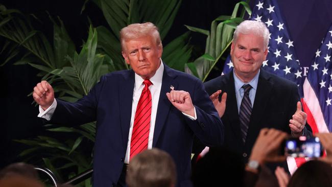 US President Donald Trump dances as House Majority Whip Tom Emmer applauds following Trump's speech before the 2025 Republican Issues Conference on January 27. Picture: Getty Images