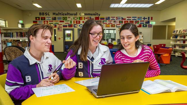 Sam Walcroft and Eliza Morwood with Numeracy Co-ordinator Caitlin Smith at Brisbane Bayside State College in Wynnum. Picture: Richard Walker