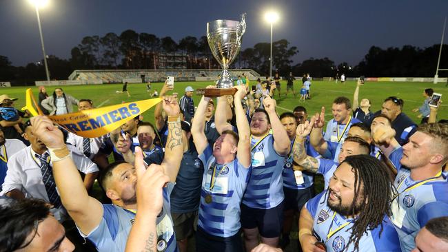 Gold Coast District Rugby Union grand final between Griffith University Colleges and Helensvale Hogs. Photo of victory celebrations. Photo by Richard Gosling