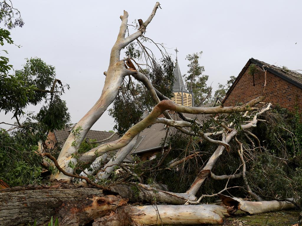 Storm damage is seen at St Johns Anglican Church, in Gordon, north of Sydney, Tuesday, November 26, 2019. A severe fast moving thunderstorm has passed over Sydney resulting in fallen trees and downed power lines in several Sydney suburbs. (AAP Image/Dan Himbrechts)