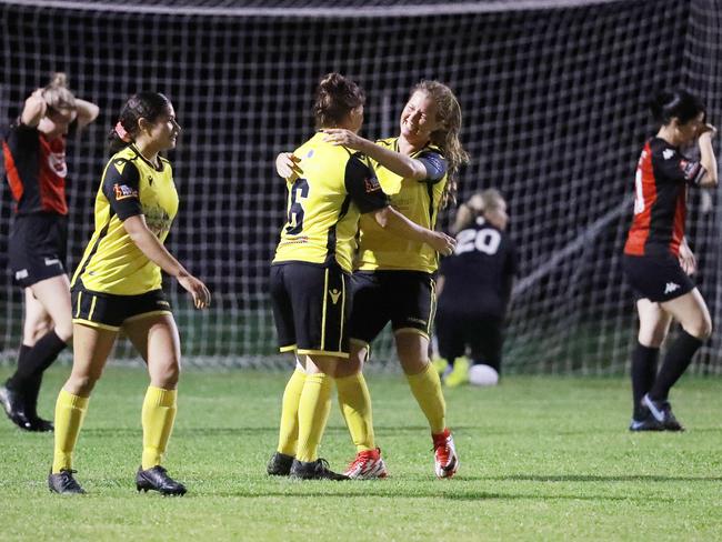 Tigers' Siobhan Macken and Josephine Whately embrace after scoring a goal. Picture: Brendan Radke