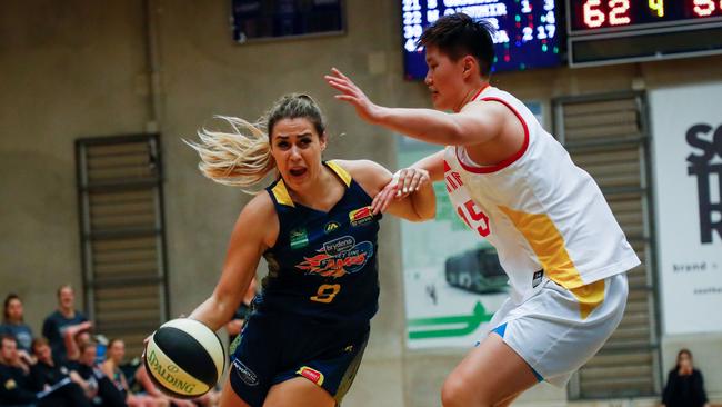 The Sydney Uni Flames played China B in a warm-up match to the WNBL. Pic: Geoff Tripp