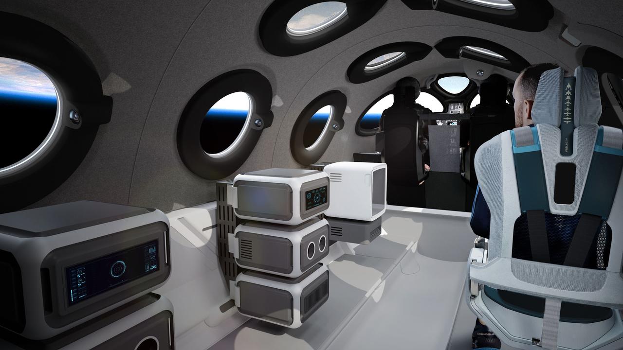 The design features reclining seats and an ‘unrestricted astronaut float zone’. Picture: Virgin Galactic/The Spaceship Company/AFP.