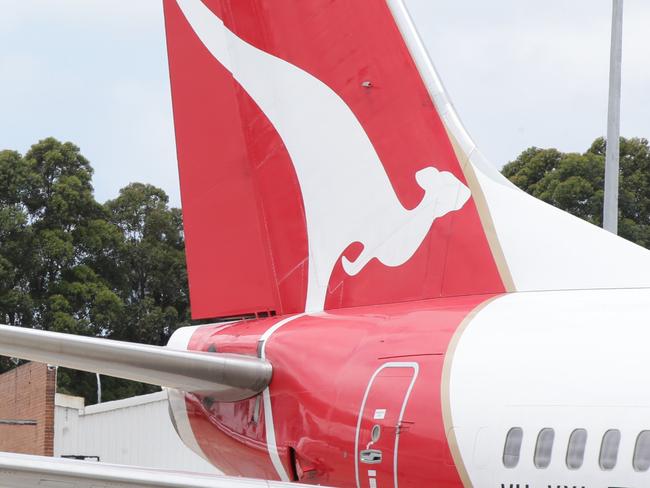 Qantas Group Chief Executive Officer Alan Joyce welcomes to Sydney a new boeing 737-800 aircraft, its QantasÕ first retro painted aircraft proudly carrying the 1971-1984 livery and bearing the name of former Qantas CEO James Strong. Picture Cameron Richardson