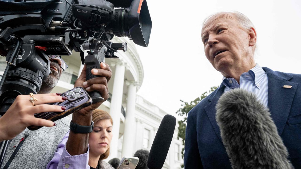 US President Joe Biden speaks to the media prior to departing on Marine One from the South Lawn of the White House in Washington, DC, on October 3, 2024. (Photo by SAUL LOEB / AFP)