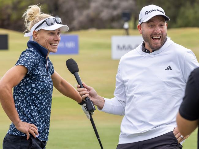 Erin Phillips and Dale Thomas before the start of the ProAm at Liv Golf Adelaide. Picture: Kelly Barnes