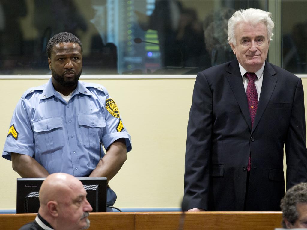 Former Bosnian Serb leader Radovan Karadzic enters the courtroom in The Hague. Picture: AP