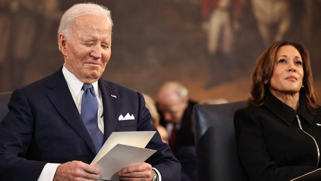Former US president Joe Biden and vice-president Kamala Harris listen as US President Donald Trump speaks during inauguration ceremonies on January 20. Picture: Getty Images