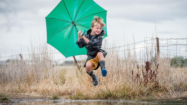 Horsham local Nate Keating (5yrs) jumps in a muddy puddle after the first rain in months fell in drought affected areas in Western Victoria. CONTACT: Mother's name Sharon... 0408144758. Picture: Jake Nowakowski