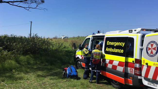 NSW Ambulance at the scene where a skydiver hit the ground. Picture: Care Flight