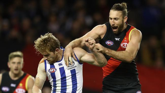 Cale Hooker taps the head of Daniel Nielsonas he celebrates after a goal. Picture: Getty Images