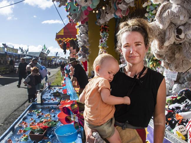 Operator Sarah Gill with baby Romy at the Innisfail Show. Picture: Brian Cassey