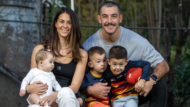 Walker with wife Ellie and Hugo, 3, Louis, 2, and Hattie, 7 months, at home. Picture: Emma Brasier.