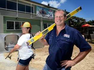 Treena Wright and Paul Gillespie work on the Fingal Head surf club. Photo: John Gass / Daily News. Picture: John Gass