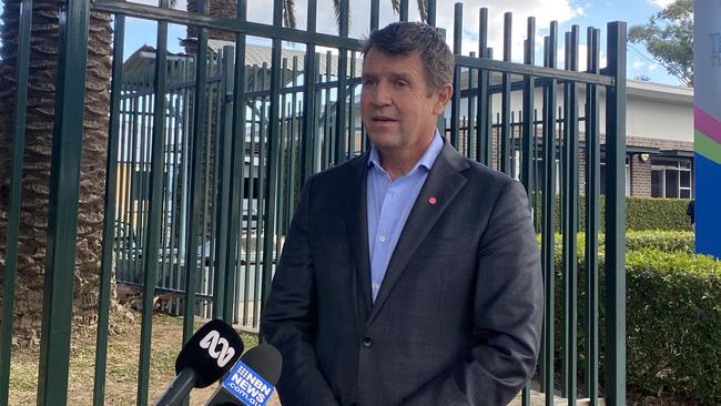 HammondCare CEO Mike Baird speaking outside Tinonee Gardens, where no cases in residents have been reported. Picture: Emily Burley.