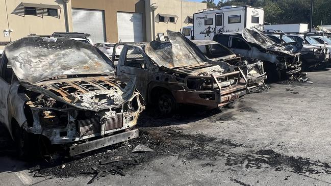 Burnt out cars at a Biggera Waters business after a suspected arson attack. Picture: Keith Woods.