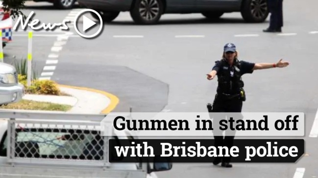 Brisbane in lockdown as police hold gunmen up in apartment building